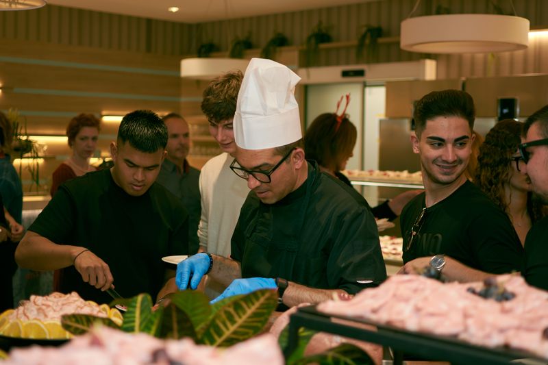Papa Ginos catering team preparing food for an event
